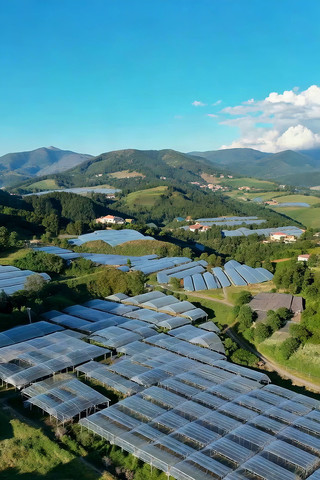 航拍山地间的农业大棚 航拍山地间的农业大棚