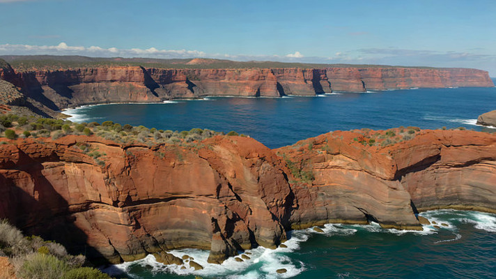 海岸边红色岩石与海洋景观 海岸边红色岩石与海洋景观