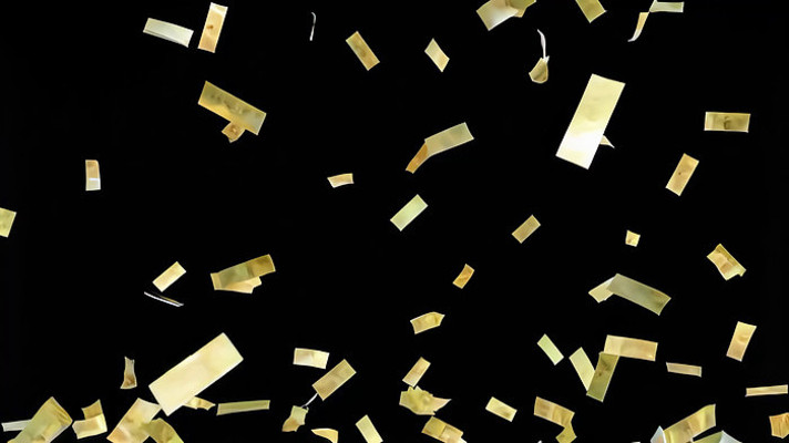 黑色背景金色纸屑飘落素材 黑色背景金色纸屑飘落素材