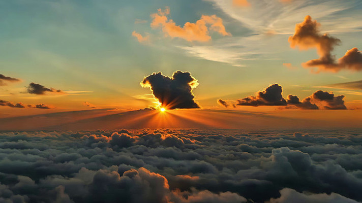 云海之上的日出景象 云海之上的日出景象