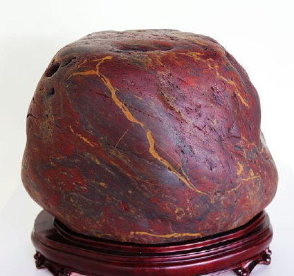 ���˵�ͷ����ʯ