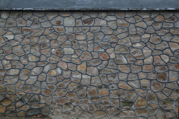 Ĩ�ڱߵĲ�����ʯ��ǽ����